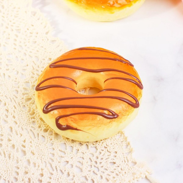 Donut Squishy Toy

Cute novelty squishy toy designed as donut. Perfect for gifts, impulse buys, and themed novelty displays.

- Ages 3+
- Approximately 3" L