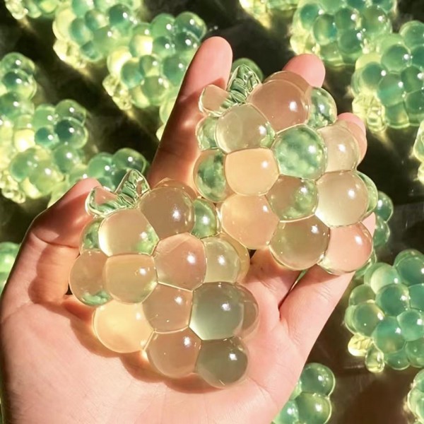 Gel Grapes Squishy Toy

Cute novelty squishy toy designed as a gel grapes. Perfect for gifts, impulse buys, and themed novelty displays.

- Ages 3+
- Approximately 3" L