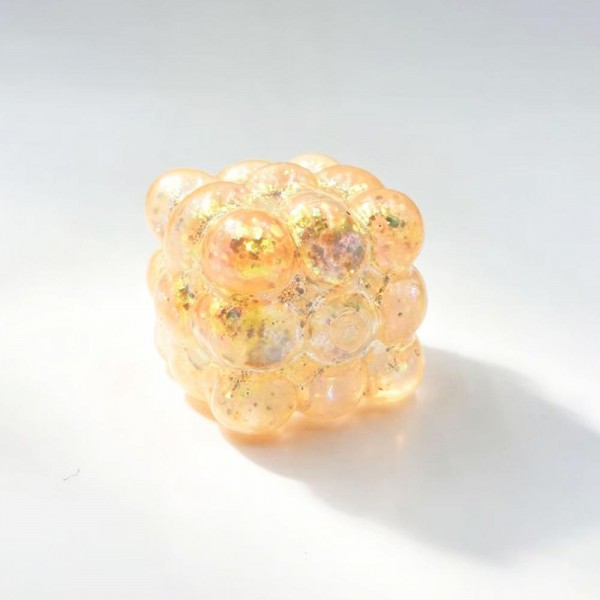 Glitter Bubble Cube Squishy Toy

Cute novelty squishy toy designed as translucent textured cube. Perfect for gifts, impulse buys, and food-themed novelty displays.

- Ages 3+
- Approximately 3" L