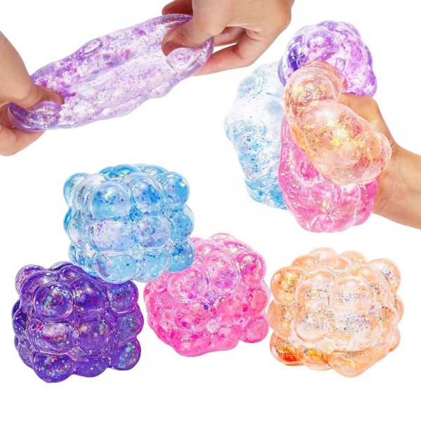 Glitter Bubble Cube Squishy Toy

Cute novelty squishy toy designed as translucent textured cube. Perfect for gifts, impulse buys, and food-themed novelty displays.

- Ages 3+
- Approximately 3" L