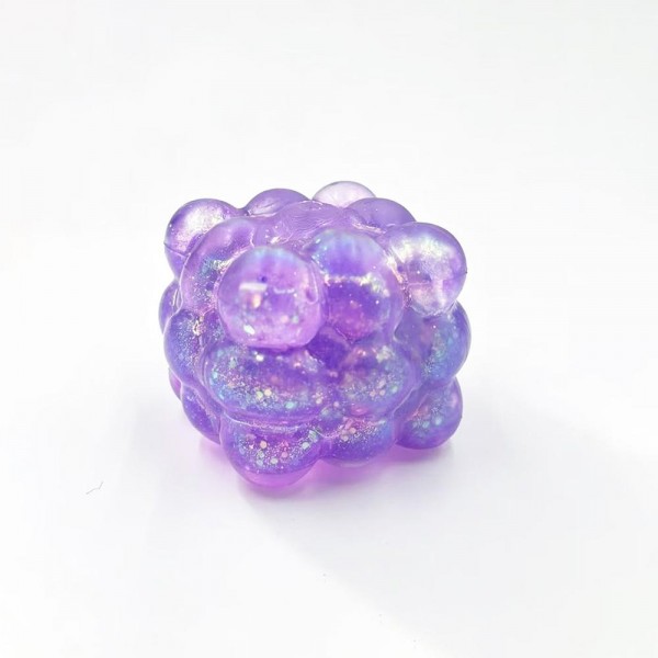 Glitter Bubble Cube Squishy Toy

Cute novelty squishy toy designed as translucent textured cube. Perfect for gifts, impulse buys, and food-themed novelty displays.

- Ages 3+
- Approximately 3" L
