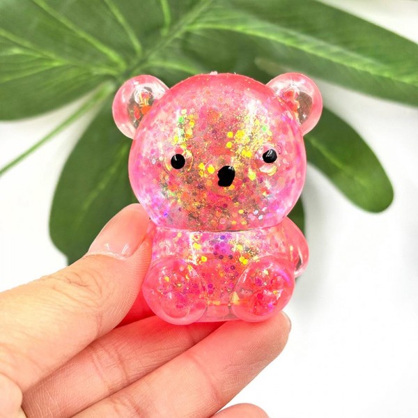 Glitter Bear Squishy Toy

Cute novelty squishy toy designed as a gel glitter bear. Perfect for gifts, impulse buys, and themed novelty displays.

- Ages 3+
- Approximately 3" L