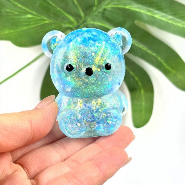 Glitter Bear Squishy Toy

Cute novelty squishy toy designed as a gel glitter bear. Perfect for gifts, impulse buys, and themed novelty displays.

- Ages 3+
- Approximately 3" L