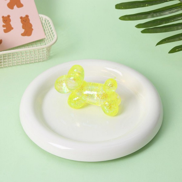 Glitter Balloon Animal Squishy Toy

Cute novelty squishy toy designed as translucent glitter balloon animal. Perfect for gifts, impulse buys, and themed novelty displays.

- Ages 3+
- Approximately 3" L