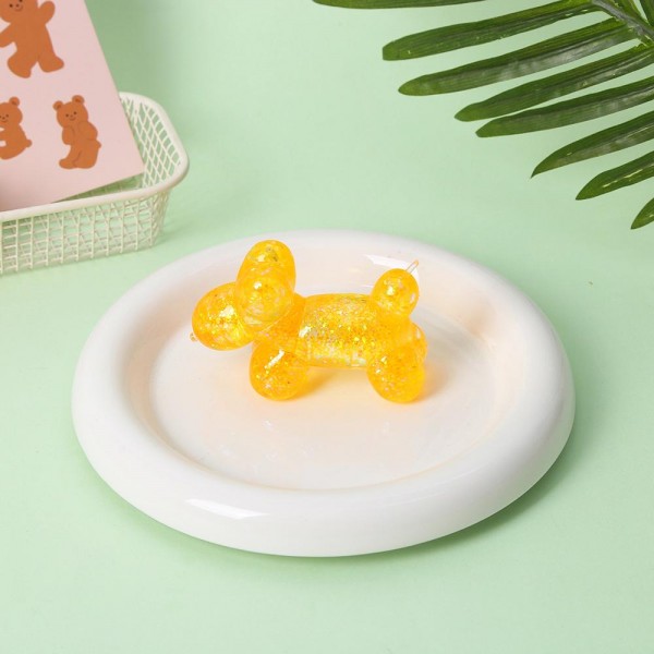 Glitter Balloon Animal Squishy Toy

Cute novelty squishy toy designed as translucent glitter balloon animal. Perfect for gifts, impulse buys, and themed novelty displays.

- Ages 3+
- Approximately 3" L