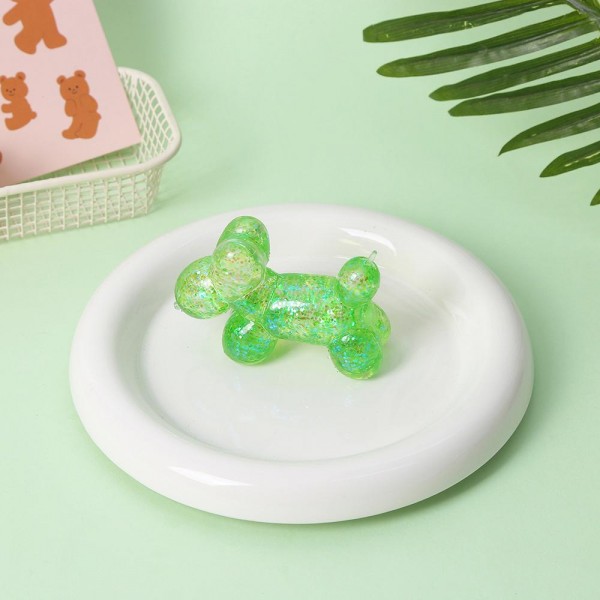 Glitter Balloon Animal Squishy Toy

Cute novelty squishy toy designed as translucent glitter balloon animal. Perfect for gifts, impulse buys, and themed novelty displays.

- Ages 3+
- Approximately 3" L