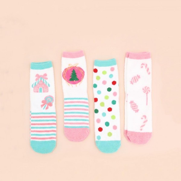Holiday crew sock set with four coordinating pairs in a soft cotton blend knit with cushioned soles. Ribbed cuffs stay put without digging in, and the seasonal motifs are knit in rather than printed so they survive the wash. A ready made gift for boutique buyers stocking stocking stuffers, teacher gifts, secret santa, and holiday markets. Boxed sock sets ring up as an easy impulse grab and reorder through December.