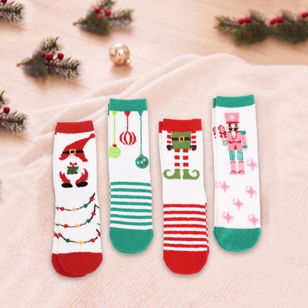 Holiday crew sock set with four coordinating pairs in a soft cotton blend knit with cushioned soles. Ribbed cuffs stay put without digging in, and the seasonal motifs are knit in rather than printed so they survive the wash. A ready made gift for boutique buyers stocking stocking stuffers, teacher gifts, secret santa, and holiday markets. Boxed sock sets ring up as an easy impulse grab and reorder through December.