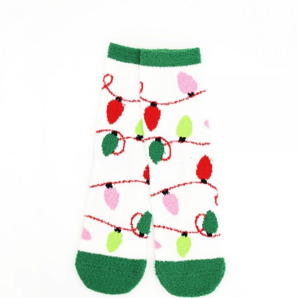 Holiday crew sock set with four coordinating pairs in a soft cotton blend knit with cushioned soles. Ribbed cuffs stay put without digging in, and the seasonal motifs are knit in rather than printed so they survive the wash. A ready made gift for boutique buyers stocking stocking stuffers, teacher gifts, secret santa, and holiday markets. Boxed sock sets ring up as an easy impulse grab and reorder through December.