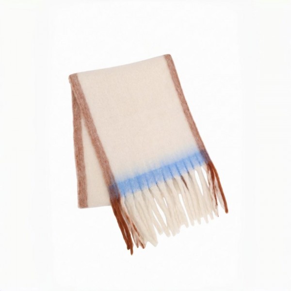 Oversized Plaid Blanket Scarf with soft brushed finish and fringed edges. Generously sized to wear looped, draped, or wrapped as a shawl, it layers beautifully over coats and sweaters for instant cold-weather polish. A fall and winter staple that anchors seasonal displays — boutique customers stock multiple patterns because these fly off the shelf as gifts and self-purchases alike.