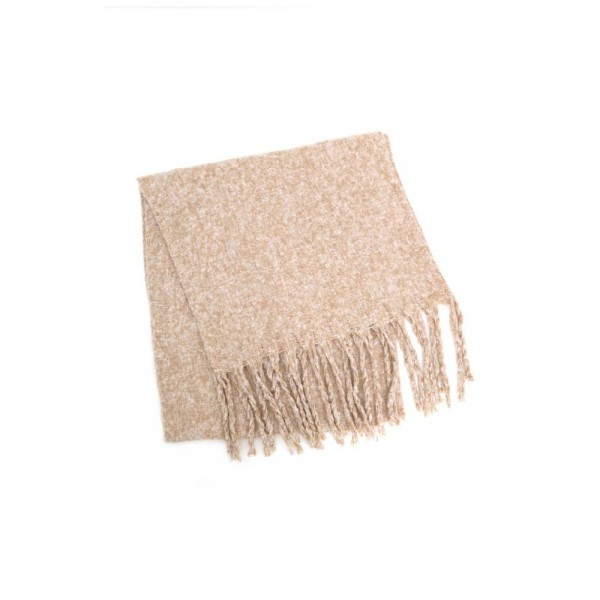 Chunky boucle knit scarf in a lofty marled yarn with long shaggy fringe. Extra wide and extra long, it wraps twice with room to spare and holds warmth without feeling heavy. A cold weather staple for boutique buyers stocking travel, tailgates, farmers markets, and holiday gifting. Oversized knit scarves fill a display fast and reorder in every shade once temperatures drop.