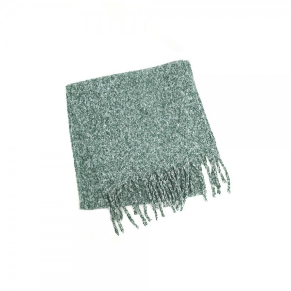 Chunky boucle knit scarf in a lofty marled yarn with long shaggy fringe. Extra wide and extra long, it wraps twice with room to spare and holds warmth without feeling heavy. A cold weather staple for boutique buyers stocking travel, tailgates, farmers markets, and holiday gifting. Oversized knit scarves fill a display fast and reorder in every shade once temperatures drop.