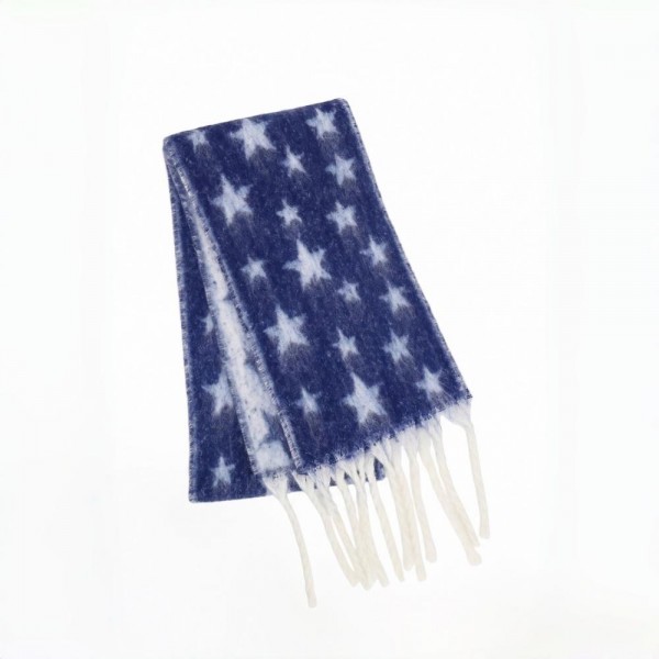 Star Print Fringe Scarf in a soft brushed woven fabric with an allover star pattern and hand knotted fringe ends. Generously sized to wrap, loop, or drape open over a coat, and light enough to keep on indoors. Star prints read festive without being locked to one holiday, so it sells from early fall straight through the new year. A dependable scarf program at a boutique friendly price point.