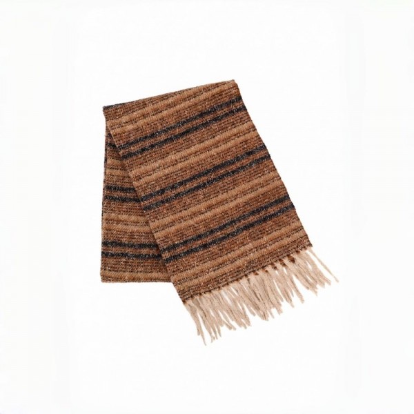 Striped woven scarf in a brushed heavyweight knit with knotted fringe on both ends. Long wrap length loops twice or hangs open over a coat, and the multi stripe weave pairs back to neutrals all season. A cold weather staple for boutique buyers stocking travel, tailgates, farmers markets, and holiday gifting. Striped fringe scarves are the easiest add on at the register and reorder as soon as it turns cold.