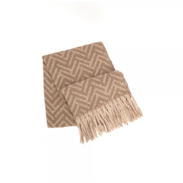 Woven chevron scarf in a brushed heavyweight knit with hand knotted fringe on both ends. Long wrap length loops twice or hangs open over a coat, and the soft two tone weave reads dressy or casual. A cold weather staple for boutique buyers stocking travel, tailgates, farmers markets, and holiday gifting. Fringe scarves are the easiest add on at the register and reorder once temperatures drop.