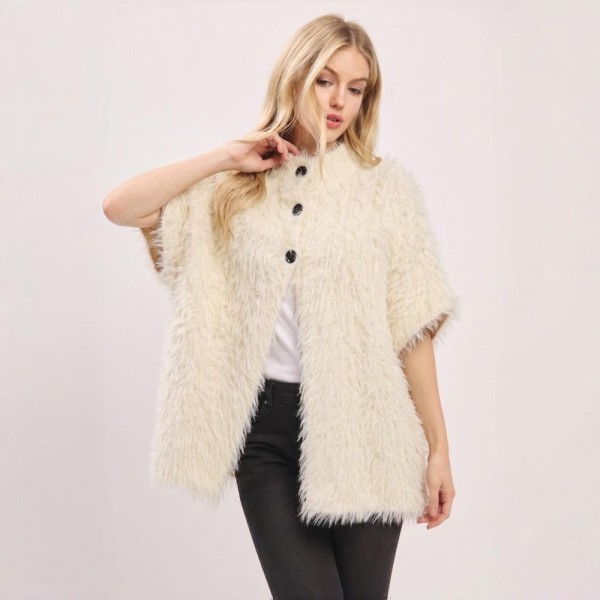 Shaggy faux fur cardigan with a button front, elbow length sleeves, and a soft knit backing. Relaxed one size cut layers over a tee and denim or a slip dress, and the long pile finish gives a coat look without the weight. A fall and winter layer for boutique buyers stocking holiday parties, date nights, travel, and cold office mornings. Textured fur jackets are the piece customers try on first and reorder in every shade.