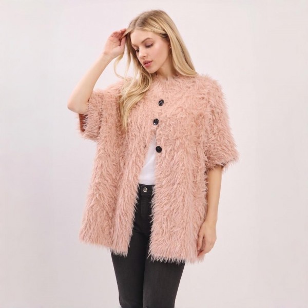 Shaggy faux fur cardigan with a button front, elbow length sleeves, and a soft knit backing. Relaxed one size cut layers over a tee and denim or a slip dress, and the long pile finish gives a coat look without the weight. A fall and winter layer for boutique buyers stocking holiday parties, date nights, travel, and cold office mornings. Textured fur jackets are the piece customers try on first and reorder in every shade.