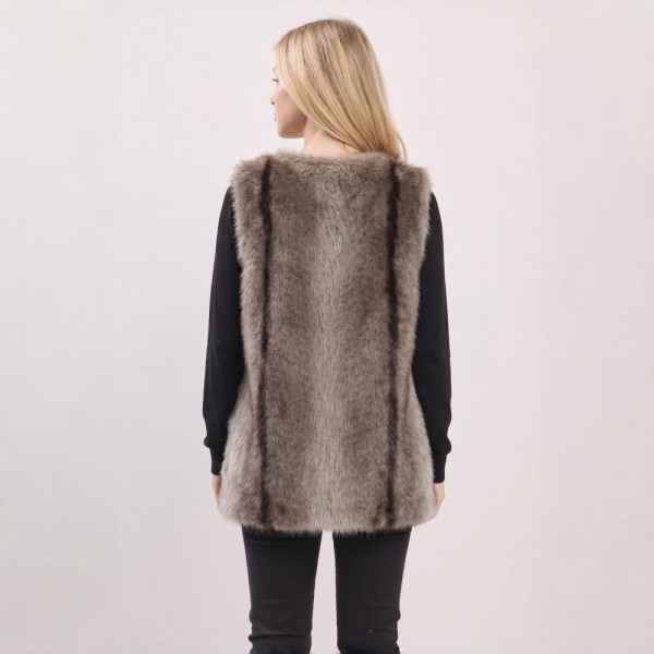 Luxe Faux Fur Longline Vest with plush multi-tonal texture and a sleek hook-and-eye closure. The mid-thigh silhouette adds instant polish layered over sweaters, turtlenecks, and denim — a statement layering piece that elevates any fall or winter outfit. A premium-feel piece that commands attention on the rack and delivers strong margins for boutique sellers.