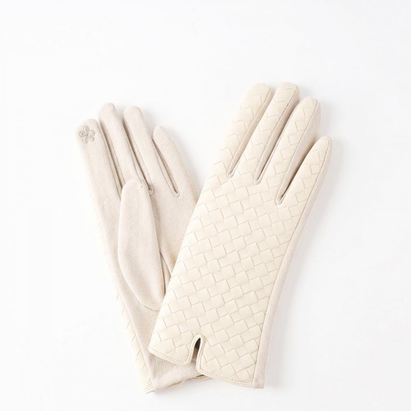 Touchscreen gloves with a quilted diamond stitch back and a soft brushed palm. Conductive fingertips let her text and scroll without pulling them off, and the slim quilted panel adds shape without weight. A fall and winter accessory for boutique register displays, tailgates, school pickup, and cold morning commutes. Quilted texting gloves are a clean everyday style that reorders all season.
