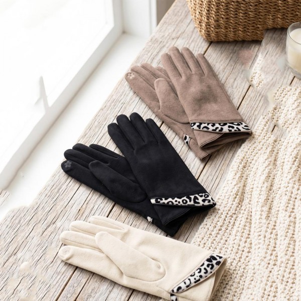Touchscreen gloves in a soft brushed knit with an animal print cuff and a slim tailored fit. Conductive fingertips keep her phone in hand, and the stretch body layers under a coat sleeve without bunching. A fall and winter accessory for boutique register displays, game days, school pickup, and cold morning commutes. Printed cuff texting gloves are an easy impulse add on that reorders once the weather turns.