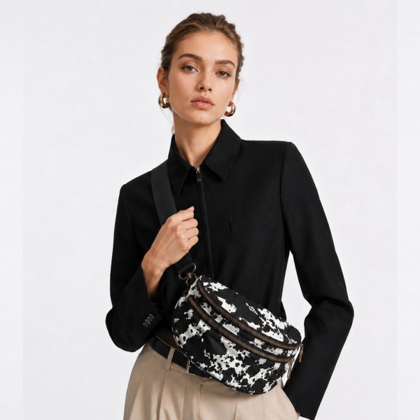 Do Everything In Love Nylon Cow Print Cross Body Bag

- Full Zip Closure
- 2 Front External Zip Pockets
- 1 Back External Zip Pocket  
- Lined Body
- 1 Internal Zip Pocket
- Removable Cross Body Strap
- 100% Polyester
- Approximately 12" L X 9" T X 4" D