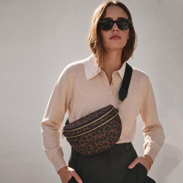 Do Everything In Love Nylon Animal Print Cross Body Bag

- Full Zip Closure
- 2 Front External Zip Pockets
- 1 Back External Zip Pocket  
- Lined Body
- 1 Internal Zip Pocket
- Removable Cross Body Strap
- 100% Polyester
- Approximately 12" L X 9" T X 4" D