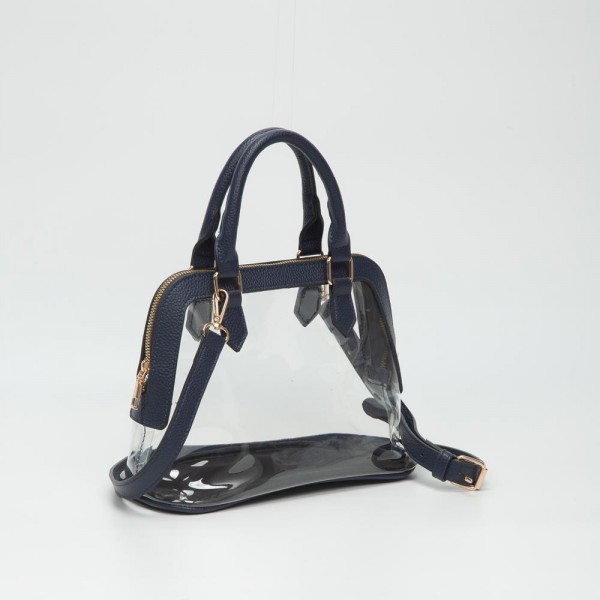 Clear Tote Bag With Vegan Leather Trim

- Full Zip Closure
- Detachable Vegan Leather Cross Body Strap
- Handle Drop 3.5" L
- Approximately 10" L X 7.5" T X 4.5" D
