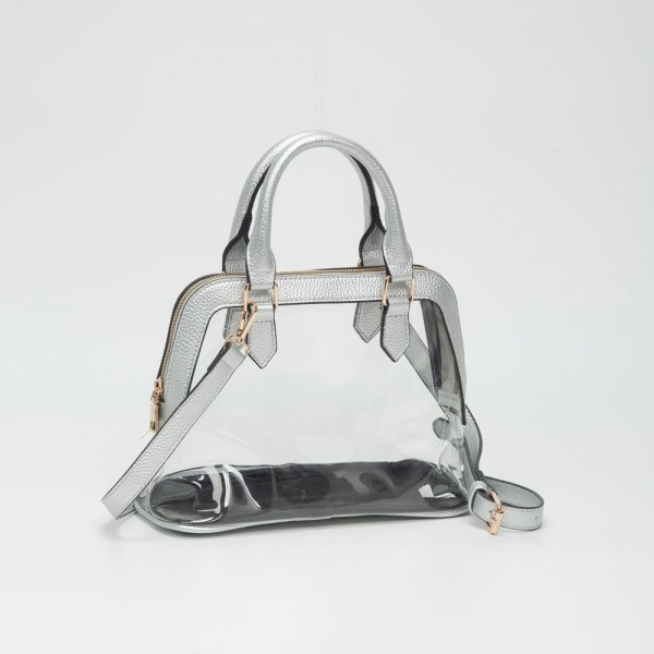 Clear Tote Bag With Vegan Leather Trim

- Full Zip Closure
- Detachable Vegan Leather Cross Body Strap
- Handle Drop 3.5" L
- Approximately 10" L X 7.5" T X 4.5" D