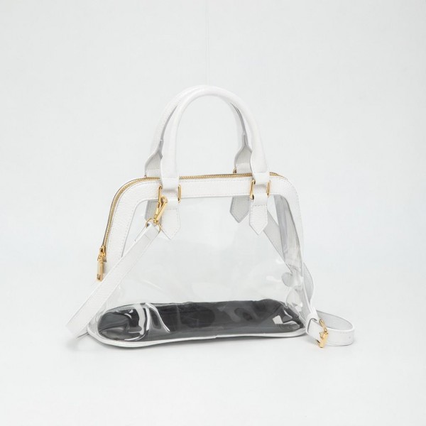 Clear Tote Bag With Vegan Leather Trim

- Full Zip Closure
- Detachable Vegan Leather Cross Body Strap
- Handle Drop 3.5" L
- Approximately 10" L X 7.5" T X 4.5" D