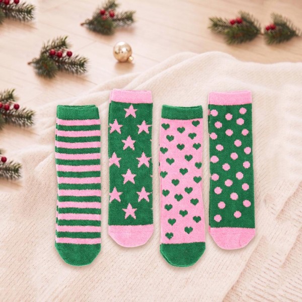 Fuzzy Holiday Crew Sock Set with a plush brushed interior and ribbed cuffs that stay put without digging in. Each set pairs coordinating festive patterns so a buyer can mix them across the season or split them into individual gifts. One size stretches to fit most adult feet. Cozy sock sets are a proven stocking stuffer and gift with purchase, and they move steadily from first frost through December.