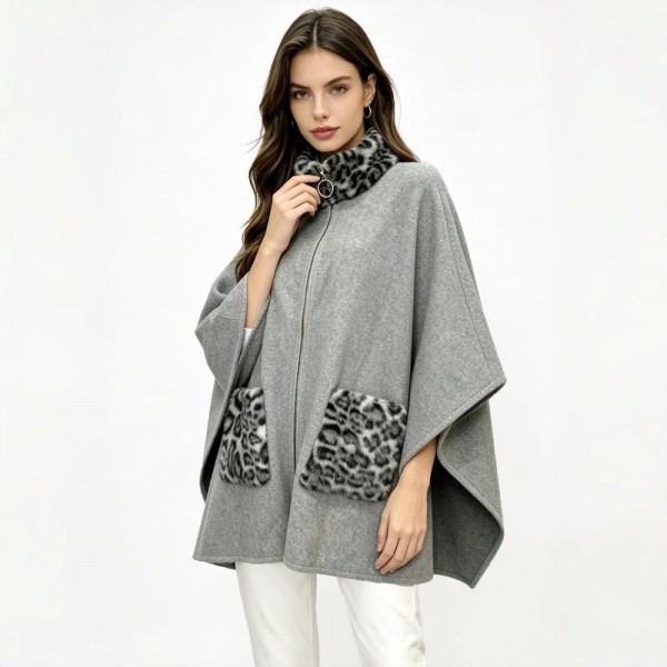 Zip-Up High Collar Poncho With Animal Print Faux Fur Accents 

- One Size Fits Most 
- 60% Polyester 40% Acrylic 
