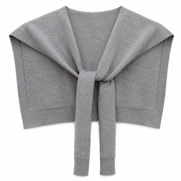 Knitted Shoulder Wrap in a soft blend of 30% cotton and 70% acrylic. Shaped to look like a sweater knotted over the shoulders, it delivers that effortless layered look in seconds. Toss it over a tee, button down, or dress for an instantly polished outfit. One size fits most, and the trend driven style makes it a standout seller for fall and winter.