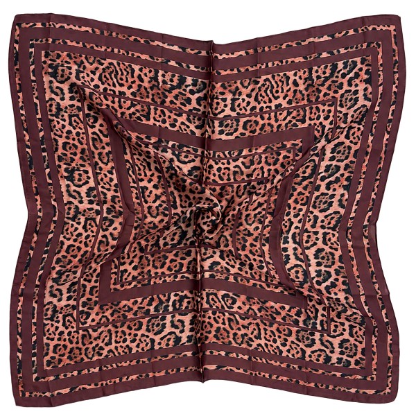 Leopard print square scarf in a fluid satin-feel woven, finished with a solid contrast border. Big enough to knot at the waist as a belt-style wrap, drape across the shoulders, or fold into a neck scarf. Animal print is a perennial fall bestseller that instantly updates a plain shirt, blazer, or denim jacket. An easy add-on sale that pairs with almost everything already on the floor.