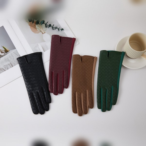 Textured Woven Gloves with an allover basketweave look and a sleek notched cuff for a tailored, polished finish. Smooth and fitted through the fingers, they add warmth without bulk under a coat sleeve. A classic choice for work commutes, church, holiday dinners, and everyday winter errands. Timeless ladies gloves are a dependable cold weather seller and a thoughtful gift for moms, teachers, and coworkers.