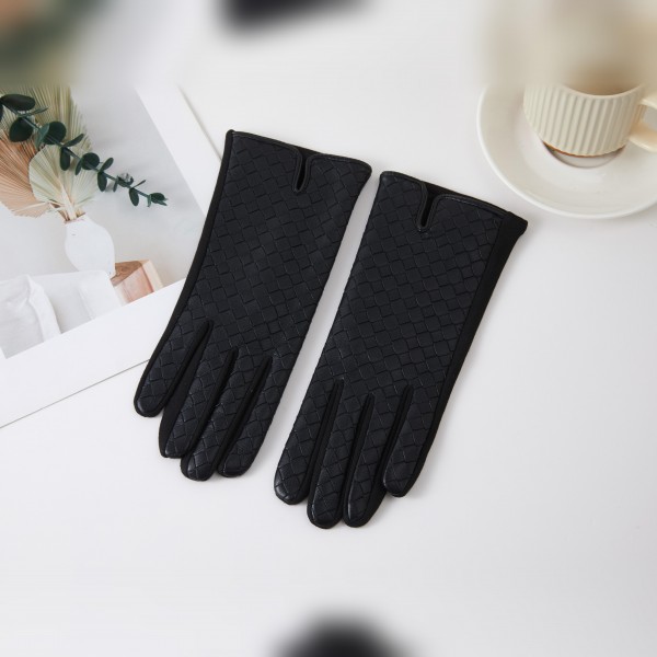 Textured Woven Gloves with an allover basketweave look and a sleek notched cuff for a tailored, polished finish. Smooth and fitted through the fingers, they add warmth without bulk under a coat sleeve. A classic choice for work commutes, church, holiday dinners, and everyday winter errands. Timeless ladies gloves are a dependable cold weather seller and a thoughtful gift for moms, teachers, and coworkers.