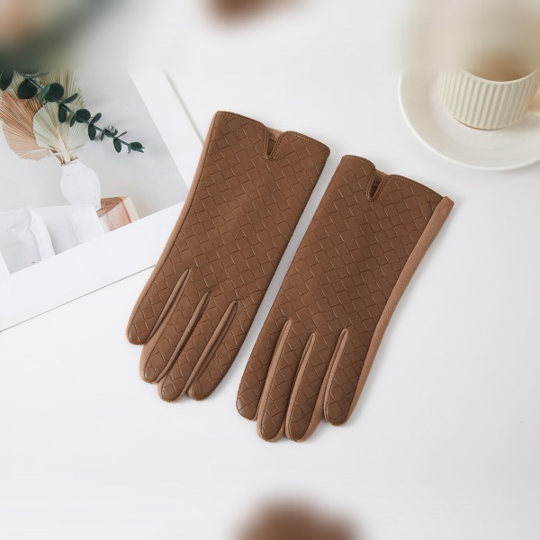 Textured Woven Gloves with an allover basketweave look and a sleek notched cuff for a tailored, polished finish. Smooth and fitted through the fingers, they add warmth without bulk under a coat sleeve. A classic choice for work commutes, church, holiday dinners, and everyday winter errands. Timeless ladies gloves are a dependable cold weather seller and a thoughtful gift for moms, teachers, and coworkers.