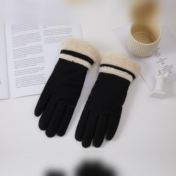 Faux Fur Cuff Gloves with a plush fuzzy trim and a contrast stripe band at the wrist for a cozy, chalet inspired look. A soft brushed body in a fitted five finger style keeps hands warm without the bulk. Perfect for holiday markets, ski lodge weekends, and chilly morning walks. Fur trimmed gloves are a winter favorite that sell well on their own and as an easy gift add on.