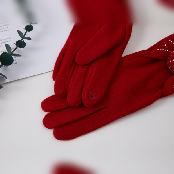 Bow Accent Gloves with a soft brushed finish and a sweet decorative bow at each wrist for a feminine, polished look. The fitted five finger silhouette keeps hands warm and pairs beautifully with wool coats and dressy winter outfits. Lovely for holiday parties, church, date nights, and everyday errands. Pretty bow gloves make a thoughtful gift and are an easy add on sale in any cold weather accessory display.