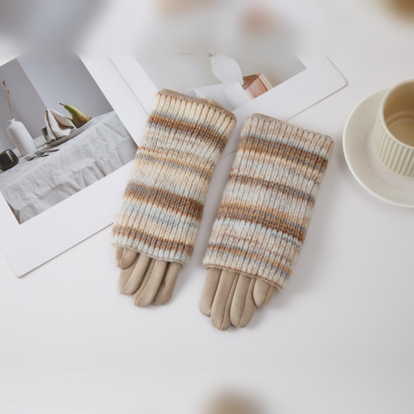 Striped Knit Cuff Gloves with a soft, smooth hand and an extra long ribbed knit cuff in a cozy multi tone stripe. The fitted five finger design keeps hands warm while still letting you grab keys and coffee with ease. Perfect for school drop off, holiday shopping, and cold morning commutes. Winter gloves are a steady cold weather seller and an easy stocking stuffer or teacher gift.