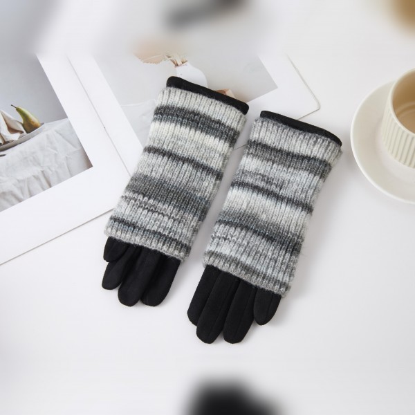 Striped Knit Cuff Gloves with a soft, smooth hand and an extra long ribbed knit cuff in a cozy multi tone stripe. The fitted five finger design keeps hands warm while still letting you grab keys and coffee with ease. Perfect for school drop off, holiday shopping, and cold morning commutes. Winter gloves are a steady cold weather seller and an easy stocking stuffer or teacher gift.