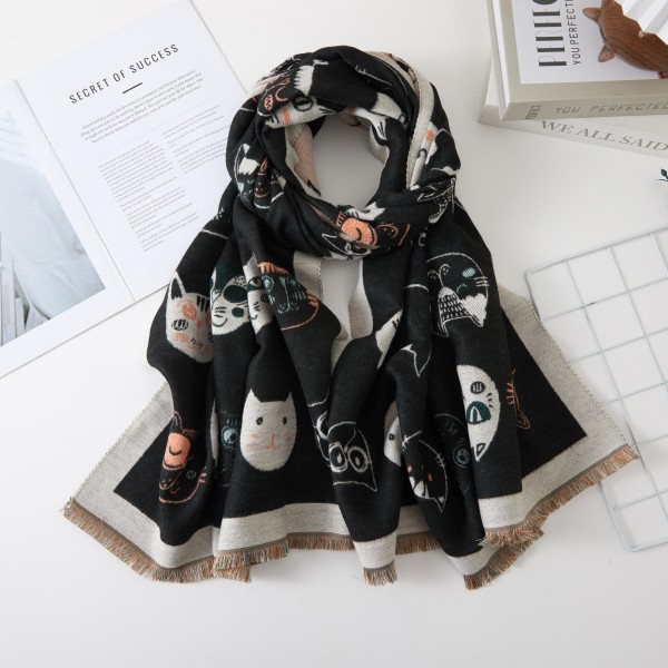Cat Print Scarf with whimsical kitty faces scattered across a soft, cozy weave and finished with a contrast border and fringe trim. This long oblong wrap drapes, loops, or knots easily for warmth on chilly days. A sweet gift for cat lovers, teachers, and pet moms who love a playful accessory. Novelty print scarves are a fun conversation starter that sells quickly all fall and winter.