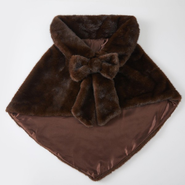 Faux Fur Bow Shrug with a wide, plush shawl collar and an oversized bow at the front. The cropped capelet silhouette layers over dresses, sweaters, and blouses for instant warmth and a polished, vintage inspired look. Perfect for holiday parties, weddings, church, and dressy winter events. Bows and faux fur are two of the season's most requested trends, making this an easy statement piece that sells quickly.
