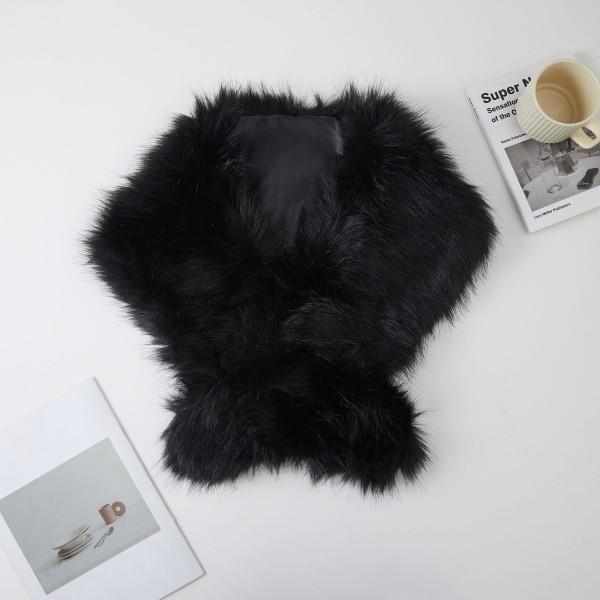 Faux Fur Stole Wrap with a long, shaggy pile and a generous length that crosses at the front or drapes open over the shoulders. It adds instant glamour to evening dresses, sweaters, and winter coats. A favorite for holiday parties, weddings, date nights, and cold weather events. Faux fur wraps are a seasonal must have and an easy gift, and they sell through fast from fall into the new year.