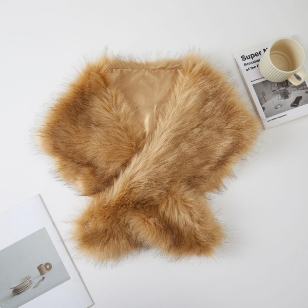 Faux Fur Stole Wrap with a long, shaggy pile and a generous length that crosses at the front or drapes open over the shoulders. It adds instant glamour to evening dresses, sweaters, and winter coats. A favorite for holiday parties, weddings, date nights, and cold weather events. Faux fur wraps are a seasonal must have and an easy gift, and they sell through fast from fall into the new year.
