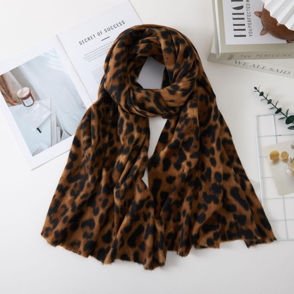 Leopard Print Oblong Scarf in a soft, brushed fabric with a generous length that wraps, loops, or drapes easily over the shoulders. The classic animal print adds instant polish to sweaters, coats, and simple fall basics. A versatile layering piece for work, weekends, and holiday gatherings. Leopard continues to be one of the season's strongest trends, and at this price point it is an easy add on that turns quickly.