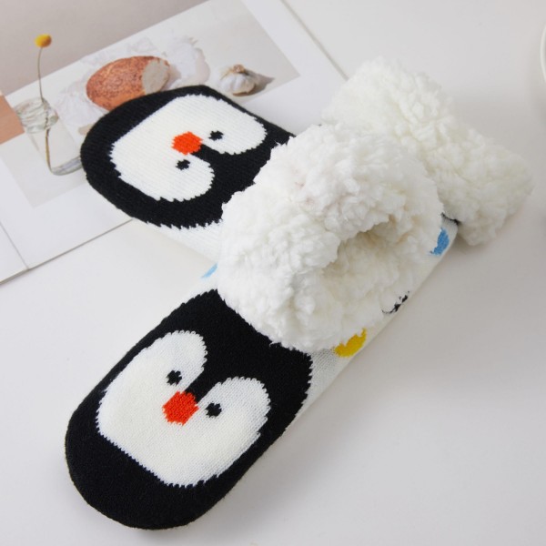 Plush Cozy Slipper Socks with a soft, thick knit and a cushioned contrast heel and toe made for comfortable lounging. The fuzzy texture keeps feet warm on cold floors, making them perfect for movie nights, slow weekend mornings, and holiday travel. Packed as an assortment of designs. Cozy socks are an easy stocking stuffer and impulse add, and they keep reordering all season long.
