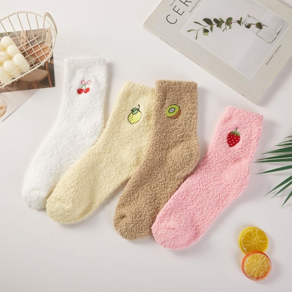 Fruit Embroidered Fuzzy Socks with a sweet little fruit design stitched at the ankle, such as cherries, kiwi, and strawberries. Cloud soft plush knit keeps feet warm and cozy while lounging at home, reading, or sleeping in. Sold in an assorted pack of cute designs that customers love to mix and match. A charming, budget friendly gift for teens, besties, and coworkers, fuzzy socks are an easy impulse add on at any register.