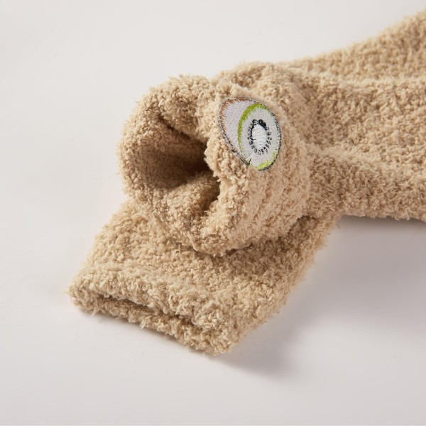Fruit Embroidered Fuzzy Socks with a sweet little fruit design stitched at the ankle, such as cherries, kiwi, and strawberries. Cloud soft plush knit keeps feet warm and cozy while lounging at home, reading, or sleeping in. Sold in an assorted pack of cute designs that customers love to mix and match. A charming, budget friendly gift for teens, besties, and coworkers, fuzzy socks are an easy impulse add on at any register.