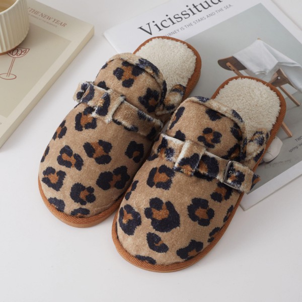 Buckle Strap Clog Slippers in a soft printed faux suede with a cozy sherpa lining and a cushioned, durable sole. The on trend clog silhouette slips on easily, and the side buckle detail gives them a polished look for coffee runs, school drop offs, and lounging at home. Comfortable and warm without feeling bulky. Clog style slippers are one of the hottest cozy trends this season, and they make a standout gift at a boutique friendly price.