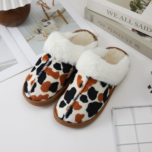 Faux Fur Collar Slippers with a plush, fluffy cuff, a soft faux suede upper, and a warm lined interior. The closed toe scuff style slips on and off with ease, while the cushioned sole adds comfort for long mornings at home, holiday visits, and quick trips to the mailbox. A luxe looking cozy essential that customers love to gift, these slippers deliver high perceived value and turn quickly from October through the holidays.